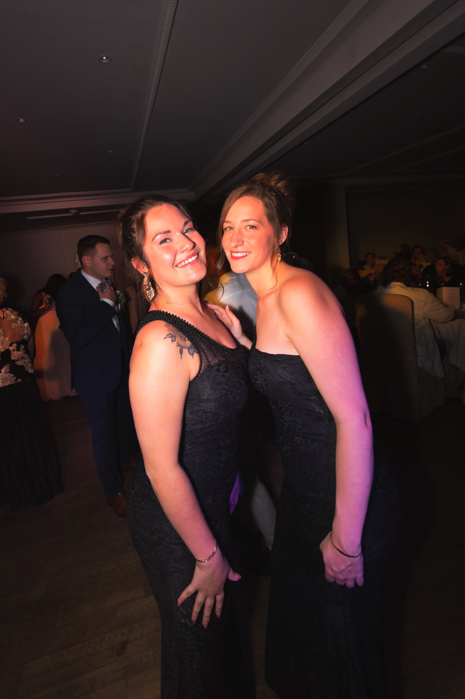 private wedding party with groom in blue and bride in white and cowgirl